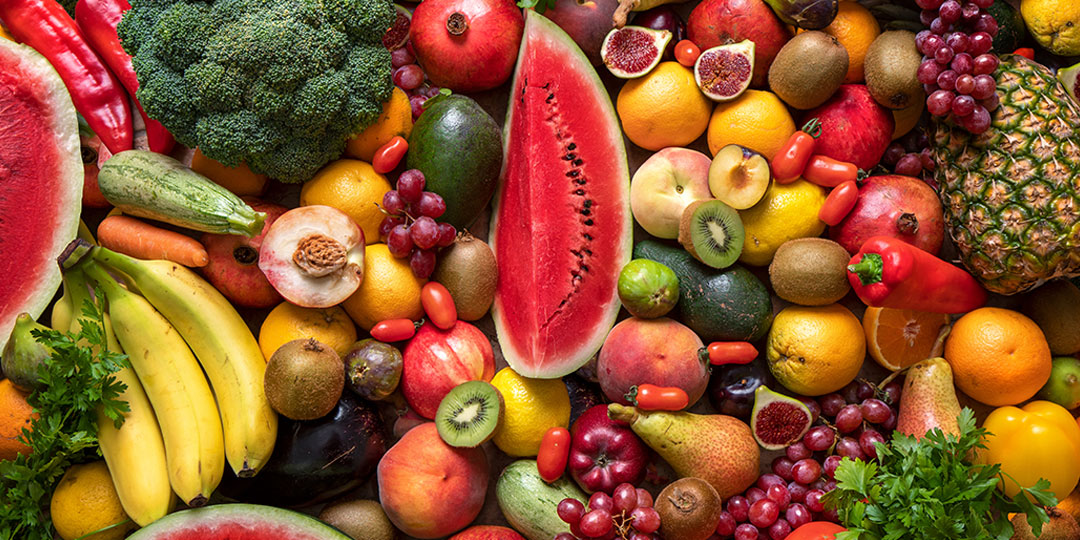 Watermelon, brocolli, pears, avocado, bananas, red chilli peppers, egg plant, grapes, tomato, pineapple